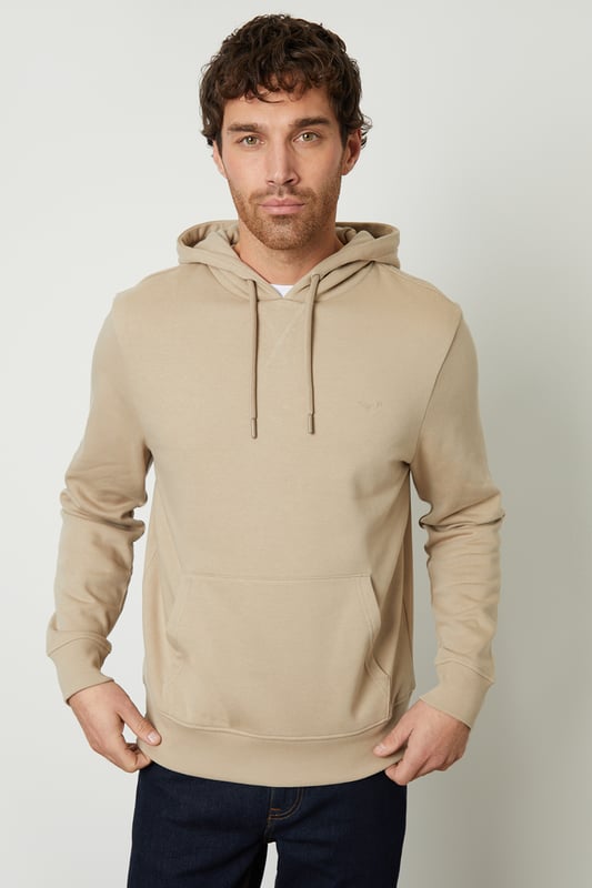 This pull-on hoodie from Threadbare features a kangaroo pocket, elasticated cuffs and hem and an adjustable drawstring hood. Style simply with a pair of matching joggers for laidback loungewear, or team with jeans and trainers for a casual outfit for your weekend outings. Made in a cotton blend fabric to ensure a really comfortable feel. Other colours and matching items available.