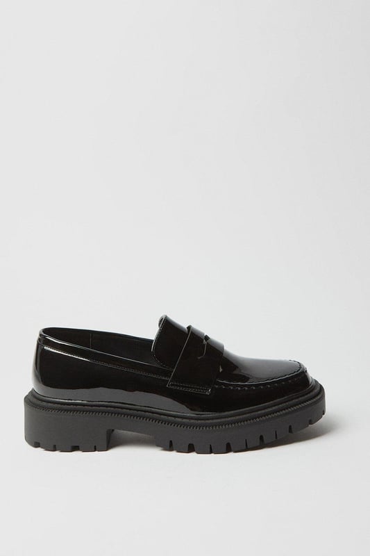 Crafted from supple faux leather, these loafers exude a polished look
Featuring a chunky sole for a touch of contemporary edge
Square toe silhouette offers a modern twist on a classic style
Snaffle detailing adds a distinctive touch of sophistication
Flat heel height between 0 and 2cm ensures all-day comfort

Effortlessly transition from day to night with these versatile loafers from Faith. Pair them with tailored trousers and a crisp blouse for the office, then switch to a flowy midi dress for an evening out. Their timeless design and comfortable flat heel make them a go-to choice for any occasion that calls for refined yet relaxed style.
