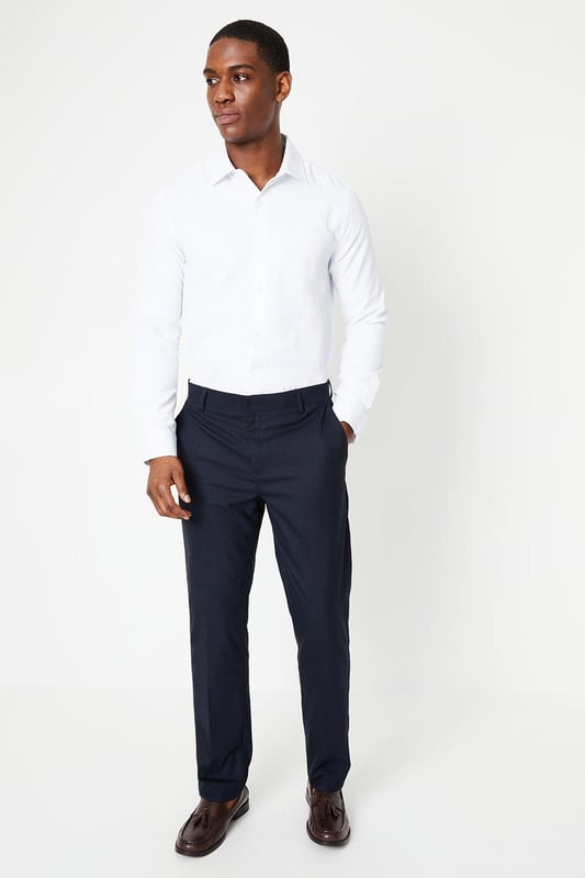 Slim fit shirt tailored for a sharp silhouette
cavalry twill fabric for a smart look
Easy iron finish for effortless maintenance
Spread collar for a refined appearance
Long sleeves with buttoned cuffs

Exuding sophistication, this slim fit shirt from Burton is a versatile choice for smart casual occasions. The cavalry twill fabric and easy iron finish ensure a polished look with minimal upkeep. Pair it with chinos or tailored trousers for a refined yet relaxed ensemble, perfect for after-work drinks or weekend brunches with friends. The spread collar and buttoned cuffs add a touch of elegance, making it an ideal option for more formal events as well.