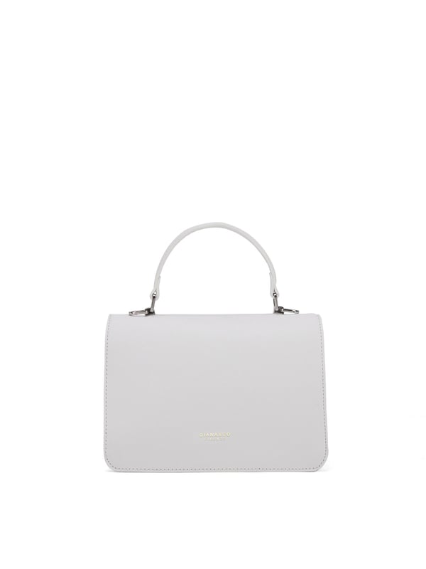 Damenhandtasche mit Magnetknopfverschluss. eine mit Reißverschluss-Innentaschen. fehlende Außentaschen. verstellbarer und abnehmbarer Schultergurt. Im PU-Griff. Drei Innenfächer.  Außenmaterial. Innen ungefüttert. Maße: 21x14x5,5 cm. Modeprodukt