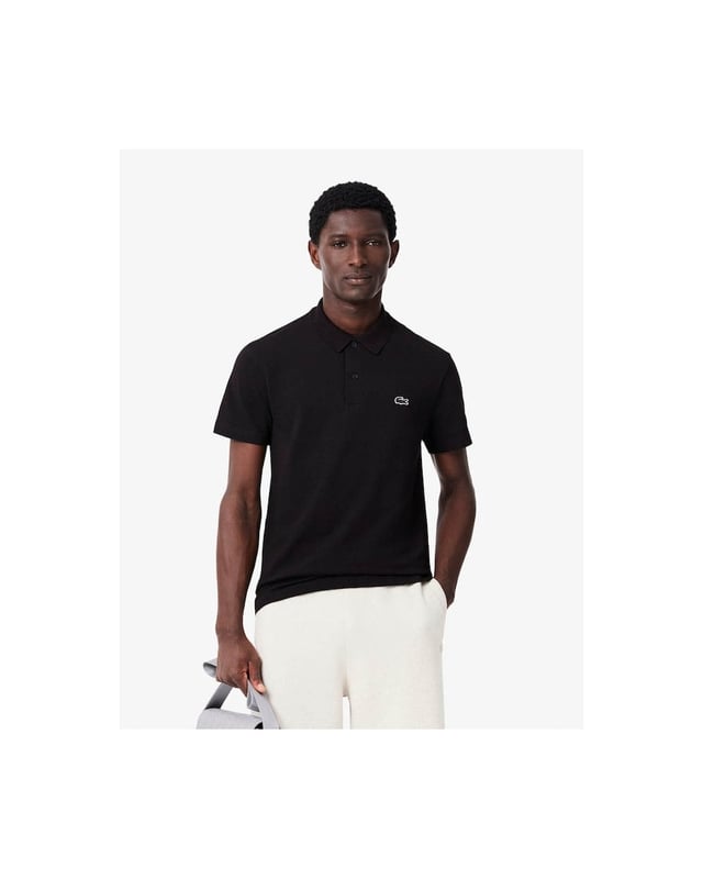 A new take on elegant sportswear with full freedom of movement from Lacoste, inventors of the polo shirt in 1933. This cotton blend knit piece features a fine rib that's particularly pleasant to wear. Featuring iconic styling and sophisticated finish details: the stuff of legends.

Organic cotton blend ottoman fabric
Regular, straight cut
Polo collar, inspired by the Original L.12.12
Pad printed detail at neck
Embroidered crocodile on chest
Main fabric: Cotton (57%), Polyester (32%), Elastane (11%) / Collar: Cotton (53%), Polyester (47%)