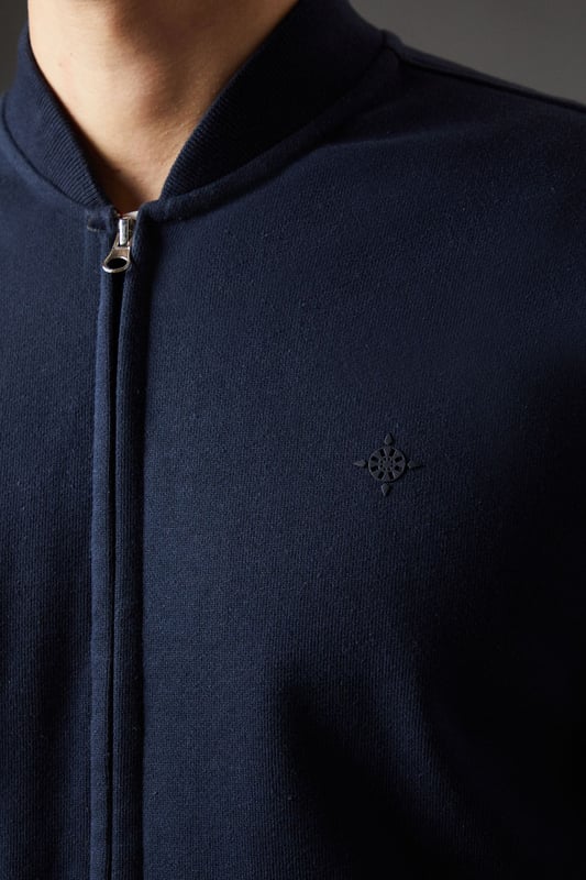 Classic baseball-style jacket design
        Full-length zip closure for versatile wear
        Ribbed collar, cuffs, and hem for a snug fit
        Subtle embroidered logo detail on the chest
        Crafted from pure cotton jersey for comfort
    
    Embrace casual sophistication with this Maine baseball jacket, a versatile addition to your wardrobe. The timeless design marries comfort and style, making it perfect for various casual occasions. Pair it with a crisp white t-shirt and your favourite jeans for a laid-back weekend look, or layer it over a polo shirt for a smart-casual ensemble suitable for family gatherings or informal outings. The pure cotton jersey fabric ensures breathability and ease of movement, ideal for those busy days when comfort is key. For a contemporary twist, try wearing it unzipped over a graphic tee with chinos and trainers. Whether you're heading to a casual lunch or enjoying a relaxed evening with friends, this jacket will keep you looking effortlessly stylish while maintaining that essential comfort factor.