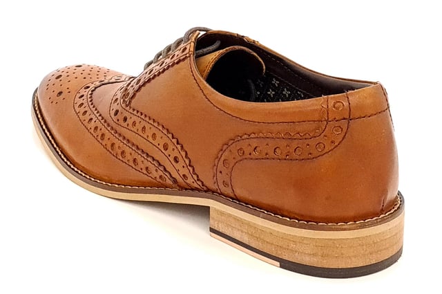 Traditional hand finished shoe with a classic brogue design and a must for any man's wardrobe for a perfect fit with formal attire. Made from genuine high quality burnished leather and cusion insole for superior comfort. These are soft to touch and look great with suits and smart wear. Handmade leather shoes with Genuine leather upper.