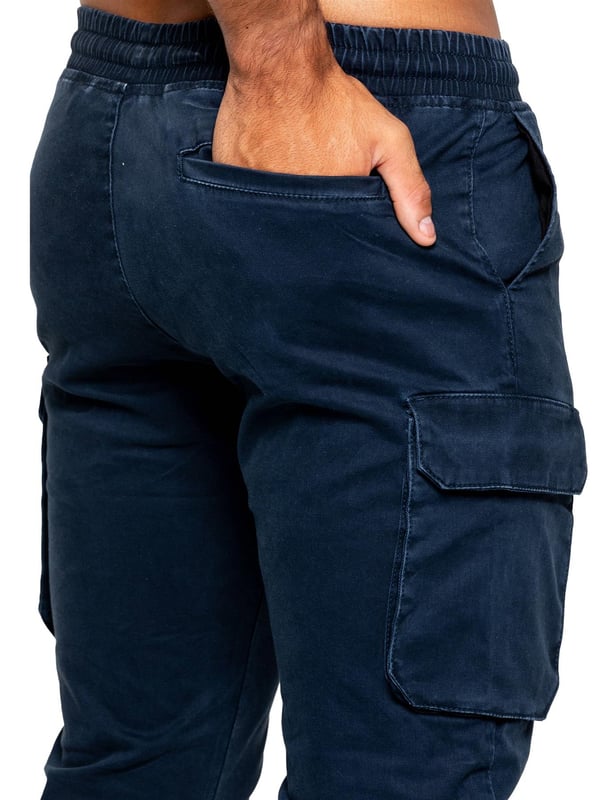 Enzo Mens Cargo Trousers. Regular Fit, Straight Leg, Enzyme Wash. 5 Pocket Design. 2 Side Pockets, 2 Cargo Pockets With Velcro Fastening. Single Back Welt Pocket. Elasticated Waistband With Adjustable Drawstring