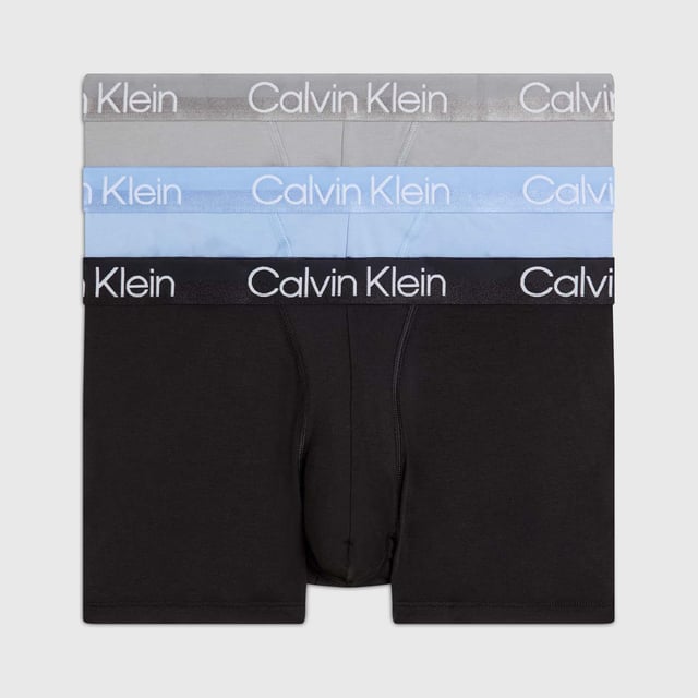 Mens Calvin Klein 3 Pack Trunks in blue.- Branded elasticated waistband.- Cotton stretch fabric.- Low rise.- Classic fit.- 95% Cotton  5% Elastane.- Ref: 000NB2970AMCAWaist: - S = 28-30in- M = 32-34in- L = 36-38in- XL = 40- 42in