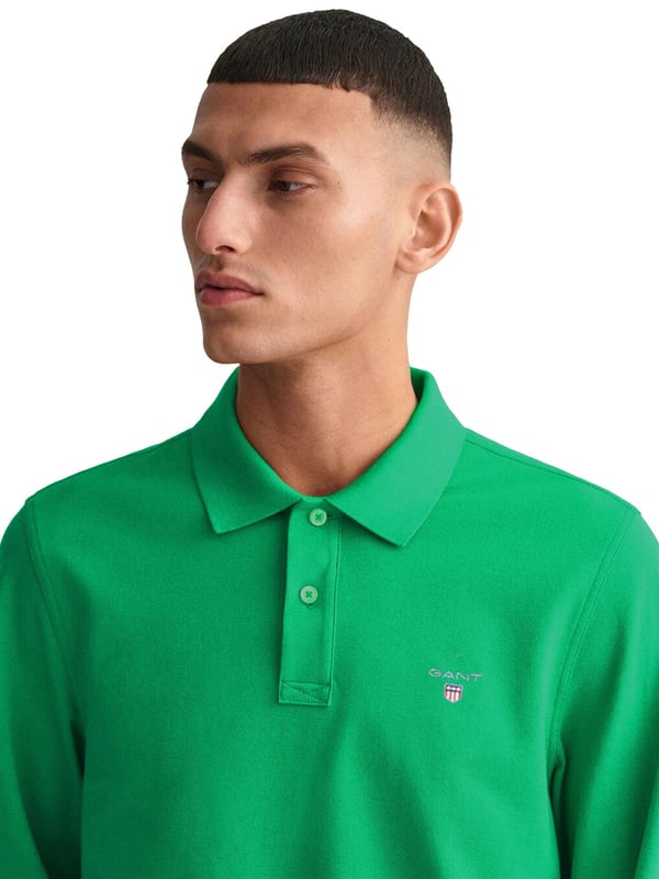 Gant Mens Designer Long Sleeve Polos feature the brands Logo, a Button-Down Collared Neckline. Crafted With 100% Cotton, these Lightweight and breathable Regular Fit Polos are Suitable for Casual or Workwear.