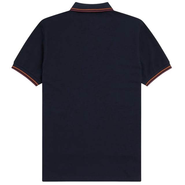 The Twin Tipped Fred Perry Polo Shirt by Fred Perry is a short sleeved polo shirt that has been made from Fred Perry's classic cotton piqué, in a contemporary adaptation of Fred's famous streamlined fit. Available in a diverse range of colourways - each with their own unique story. Featuring the signature Fred Perry wreath logo to the chest and twin tipping to the collar and cuffs.