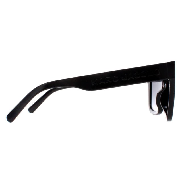 Marc Jacobs Square Womens Shiny Black Dark Grey Gradient MARC 658/S  Sunglasses feature a sleek and contemporary design with a nod to timeless style. Crafted with meticulous attention to detail, the frame showcases a blend of modern lines and classic elements, complemented by high-quality materials that promise both durability and comfort. The lenses not only offer optimal protection against harmful UV rays but also contribute to the sunglasses' undeniable allure. Finished with the iconic Marc Jacobs branding, these sunglasses effortlessly merge fashion forward aesthetics with everyday functionality, becoming an essential accessory for those who appreciate tasteful design and impeccable quality.