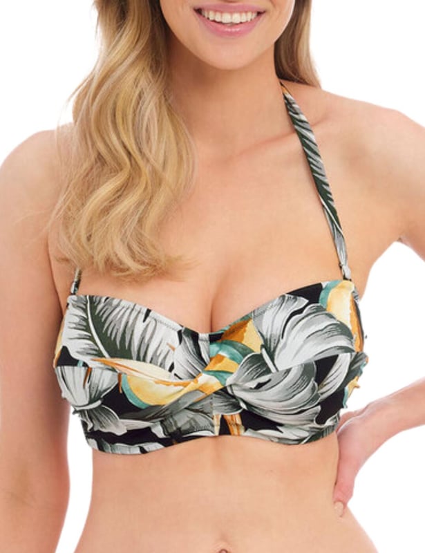 Add a splash of style to your summer poolside looks with the Fantasie Bamboo Grove bandeau bikini top. Boasting an eye-catching botanical print and a sweetheart neckline, this on-trend look will help you feel confident and stylish all season long. The concealed underwiring, lightly padded foam cups, and Powernet lining provide that extra support needed while its detachable scarf tie strap provides extra security while adding something special to your swimwear collection. The clip fastening ensures the utmost reliable fit. With many items available for a matching set for an enviable head-to-toe look, the Bamboo Grove bandeau bikini top is sure to turn heads this season!  Bandeau bikini top, Botanical print Twist front, Sweetheart neckline, Concealed underwiring, Lightly padded foam cups, Powernet lined for extra support, Detachable scarf tie strap, Clip fastening for a secure fit, Matching swimwear available, Country of origin: Tunisia, Composition: 83% Polyamide | 17% Elastane, Listed in UK sizes.   Bandeau Bikini Top