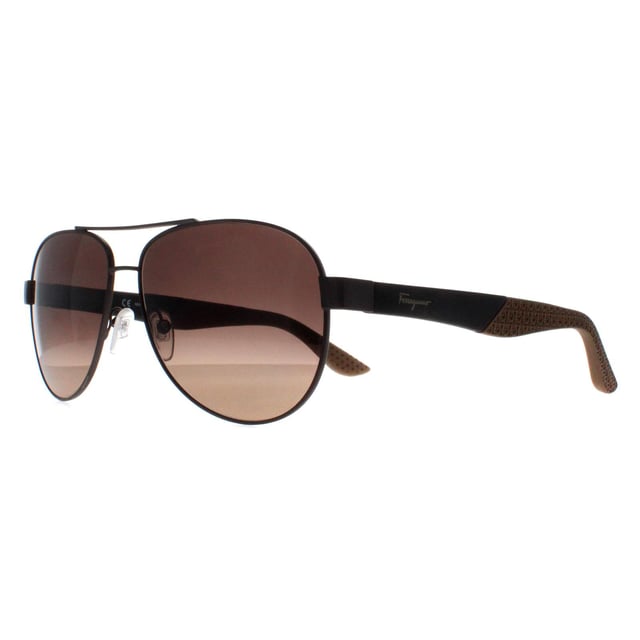 Salvatore Ferragamo Aviator Mens Matte Dark Ruthenium Grey Brown Gradient SF275S  Sunglasses exude luxury and elegance, embodying the refined craftsmanship for which the brand is known. These sunglasses feature a bold, aviator frame that makes a sophisticated statement, seamlessly blending modern design with timeless appeal. Made from high-quality metal , the SF275S offers durability and comfort, while the lenses provide full superb UV protection to shield your eyes from harmful rays. The subtle Ferragamo logo accents on the temples add a touch of understated opulence, making these sunglasses the perfect accessory for those seeking both fashion-forward style and premium functionality.