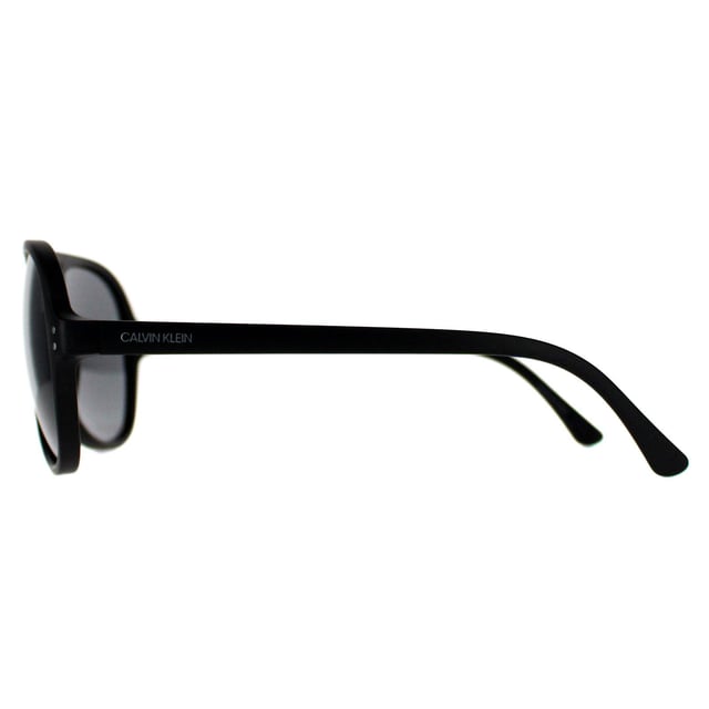 Calvin Klein Aviator Mens Matte Black  Grey CK19532S  Sunglasses are a sleek and versatile shades, boasting a timeless design that effortlessly complements any look. Crafted with precision, the lightweight frame provides comfort while exuding durability, making them perfect for everyday wear. The lenses not only offer superior UV protection but also add a touch of allure. Embrace a blend of fashion and functionality with these sunglasses, a must have accessory for those seeking elegance with an edge.