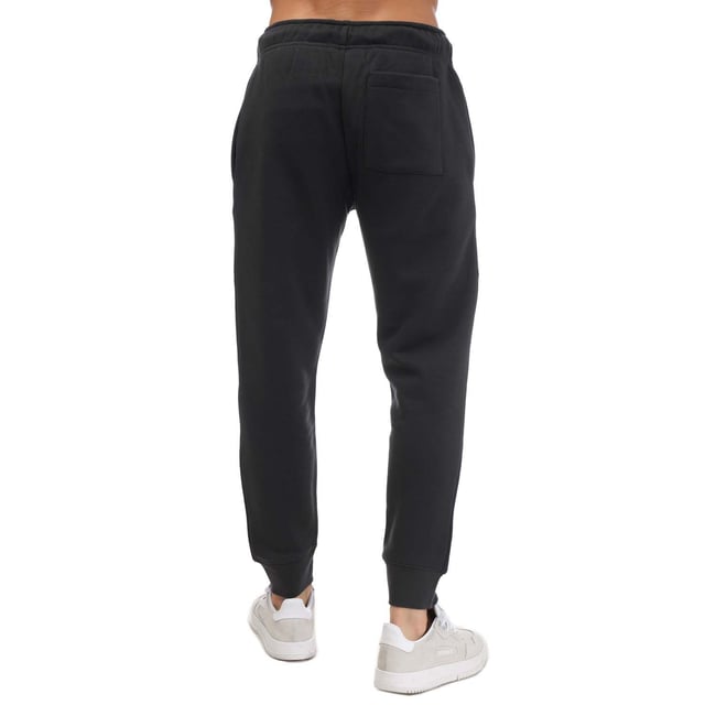 Mens DKNY Printed Logo Joggers in charcoal.- External drawcord.- Side pocket.- Back pocket.- Ribbed cuffs.- DKNY branding.- Flattering fit.- 72% Cotton  28% Polyester.- Ref: SDKD325CHA