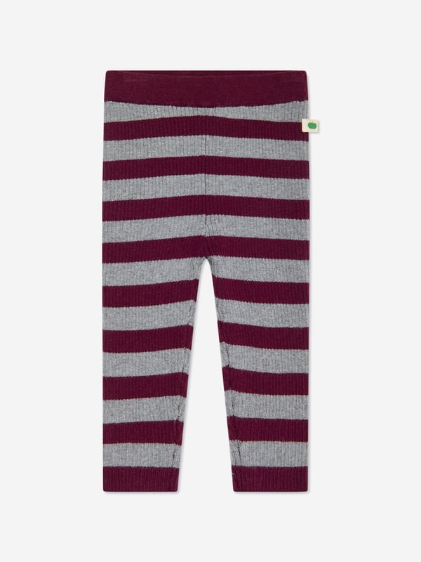 Explore the refined elegance of the *Girls Perry Ribbed Knit Leggings in Grey* by the bonnie mob, crafted for the chic little wardrobes of AW2024. Perfect for Baby, Baby Girl, and Girl, this pair promises both luxury and comfort. Key highlights:‚ **Tailored Fit:** Specially designed to offer a snug yet comfortable fit, adapting seamlessly to movement.‚ **Premium Fabric:** Constructed from superior ribbed knit material, ensuring lasting wear and softness.‚ **Versatile Grey Hue:** A sophisticated, neutral colour that pairs effortlessly with any top, enhancing versatility.‚ **Durable Design:** Made to withstand the energy of playdates and quiet times alike.Add a touch of designer sophistication with these leggings, where style meets comfort. Ideal for your little one's collection!