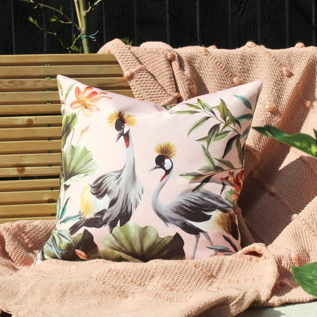 Upgrade your outdoor space with the Cranes cushion. Complete with a fully reversible design, so you get two looks in one. This colourful tropical style will instantly freshen up your garden.