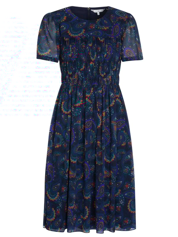 100% poliéster; vestido de Tommy Hilfiger; Modelo: WW0WW26017 0G3; Mano de obra de alta calidad; Abrazar la figura; Cuello redondo, manga corta; cremallera trasera; volantes al frente; Falda fluida, largo medio; Detalles del logo de Tommy Hilfiger