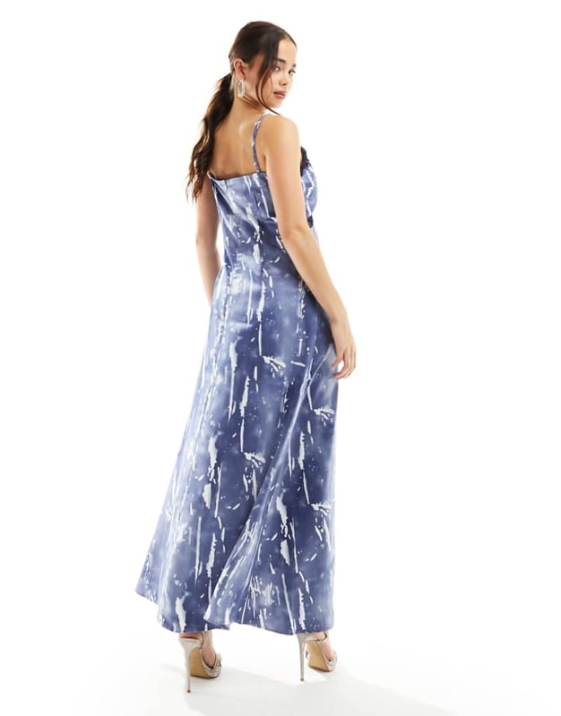 Vero Moda satin maxi slip dress with lace trim in blue crinkle print Dresses by Vero Moda Best dressed: secured V-neck Adjustable straps Lace trim Zip-back fastening Regular fitSold By: Asos