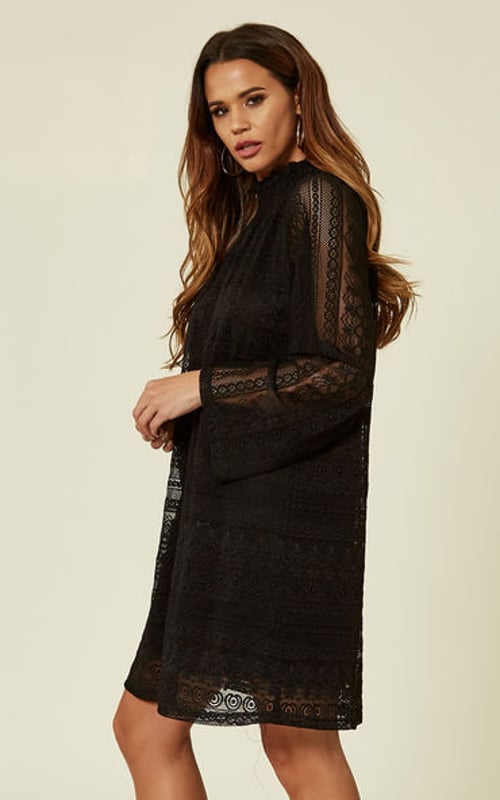 A pop of lace never goes amiss, and the alluring Layla dress is a fine example. In a moody hue perfect for colder days, it has a dramatic high neckline with subtle tucking and feminine blouson sleeves for a dash of drama. Dress it up or down for impeccable style, whatever the occasion.