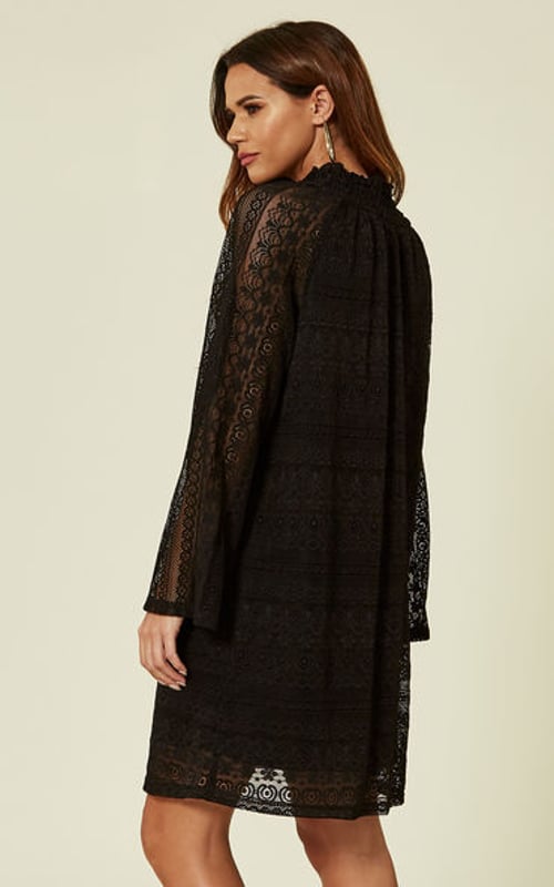 A pop of lace never goes amiss, and the alluring Layla dress is a fine example. In a moody hue perfect for colder days, it has a dramatic high neckline with subtle tucking and feminine blouson sleeves for a dash of drama. Dress it up or down for impeccable style, whatever the occasion.