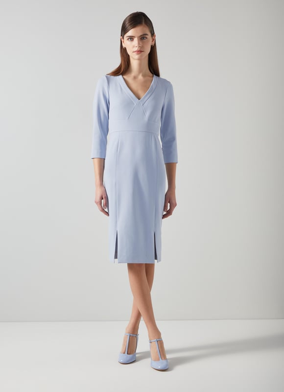 Beautifully tailored, totally timeless and kind to our planet, the new Sky shift is designed with dressy days in mind, because we all need that one dress that can do it all. Thoughtfully-made in Europe from a pale blue LENZING™ ECOVERO™ viscose* blend crepe, it's a shapely shift with a deep V-neck, three-quarter sleeves with flared cuffs, a nipped waist and a pencil skirt with slit detail. Wear it with courts and a tote for the office or with heels and a clutch for the fancier moments in your spring diary. 

*More about the fabric
LENZING™ ECOVERO™ viscose uses up to 50% less emissions and 50% less water than standard viscose. This fibre relies on wood pulp, and is crafted from sustaibly maged tree species such as beech, spruce and eucalyptus.