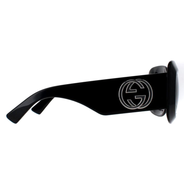 Gucci Square Womens Black with Silver Grey GG1695S  Sunglasses are perfect for those who crave a statement piece that reflects luxury and confidence. They feature a bold, square frame design that merges contemporary sophistication with a touch of retro flair. The temples are adorned with Gucciâ€™s signature double G logo, highlighting the brandâ€™s dedication to detail and heritage. Crafted with top quality materials, the lenses offer full UV protection, ensuring that wearers stay stylish and protected in the sun.