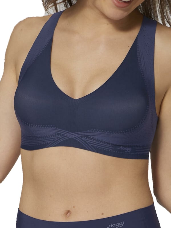 Sloggi ZERO Feel range is made from a luxuriously soft, lightweight fabric made from multi-stretch Japanese fabric for an ‘unfeelable feeling’ and complete comfort.  Featuring flat edges and flat dot-bonded seams for an invisible and no VPL look under clothing. This bralette features soft removable padded cups for a flattering fit.  Complete with re-enforced dot-bonding on the straps and on the under bust band. The laser cut printed sections offer extra support where needed. Perfect for everyday wear and ultimate comfort as the fabric does not dig in. Please note the laser cut pattern is not as vivid as seen in the photos. Size Guide: XS (8), S (10), M (12), L (14), XL (16).