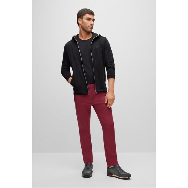 BOSS Rogan 4-1 Trousers - Elevate your performance on the course with the Rogan 4-1 Trousers by BOSS, crafted from cotton stretch making it easier to load your swing and cut in a slim fit for a stylish look. The golf trousers feature two hand pockets with ample space for small item storage, two back pockets, elasticated waist with belted loops for improving wearing comfort, finished with hook and zip closure. The look is completed by the signature BOSS logo embroidered above the back right pocket.