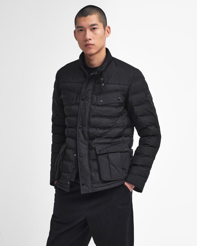 B.Intl Welded Ariel Puffer Jacket
Inspired by our rich motorcycle heritage and our signature waxed jacket designs, the B.Intl Welded Ariel Puffer jacket is display of our iconic details. Featuring two angled pockets to the chest - which featured on our waxed jackets as a way to easily access a map when riding - it's also detailed with a studded throat tab for added protection from the elements. 

Tailored fit
Main fabric: Face: 100% Polyester, Back: 100% Polyester
Trim: 100% Polyester
Inner: 100% Polyester
Filling: 100% Polyester
Machine wash 30°C - very mild process
Back length: 72cm

MQU1827