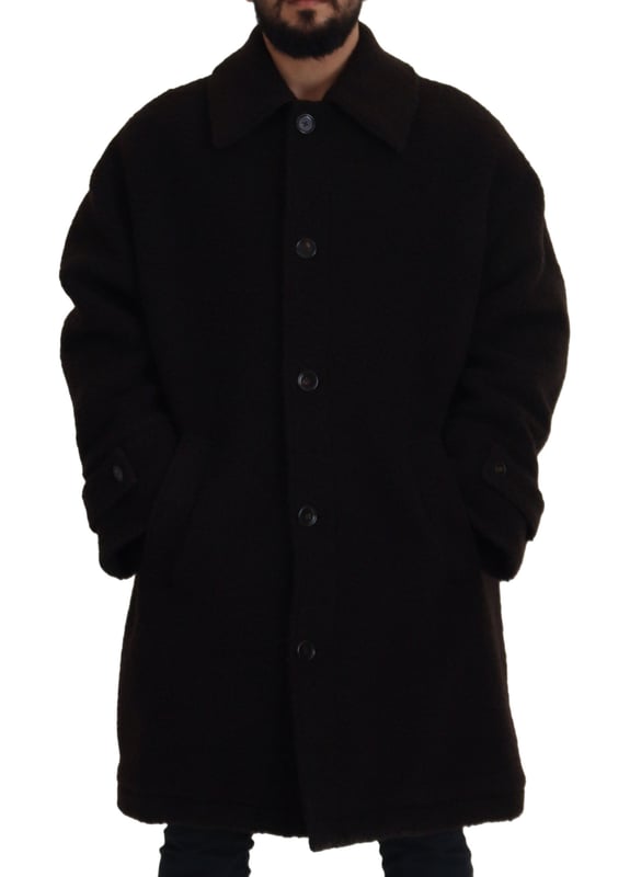 100% authentiek Dolce & Gabbana donsjack met knopen
  Vervaardigd in Italie
  Volledige knoopsluiting
  Strakke zwarte kleur
  Logo details
  Materiaalsamenstelling: 45% Alpaca 45% Wol 10% Nylon
  Voering: 100% Viscose