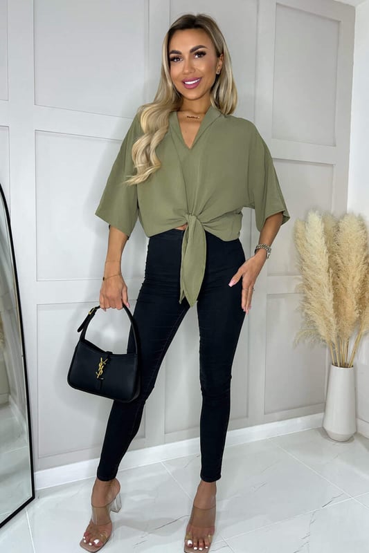 This Khaki V-Neck Collar Tie Front Shirt, is so cute for a relaxed fit
day time look with some jeans and sandals. For a more dressed up look
pair with some statement earrings, black leathers and heels ready for
a glam night out.

Model wears: UK 8/ EU 36/ US 4
Model's height: 165cm/ 5'5"
Approx length from centre back to hem: 56cm
Fabric composition: 100% Polyester
Colour: KHAKI

*print position may vary*