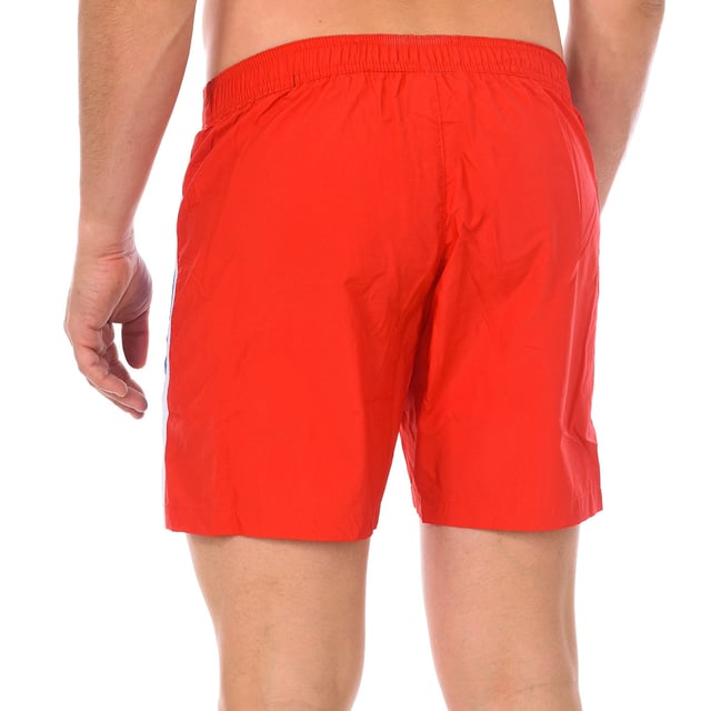 Boxer swimsuit Supreme Grip.
 Red color
 Medium style length.
 Elastic rubber waistband with crossed laces.
 Brand logo on one side.
 Seams seen in tone.
 Side pockets.
 Fabric like and soft.

 Composition: 100% Polyamide

 Wash at a maximum temperature of 30º
 -Does not support dryer
 -It does not support dry cleaning
 -Allows the use of iron
 -Hand wash
 Composition: 100% Polyamide
 Care:
Wash at a maximum temperature of 30º
 -Does not allow dryer
 -It does not support dry cleaning
 -Allows the use of iron
 -Hand wash