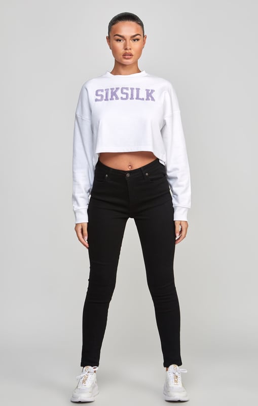 inchWhite Crop Varsity SweatshirtSoft touch fabricCropped fitEmbroidered logoCrew neckAppliqueLong sleeveMachine wash80% Cotton 20% Polyester Loopback inch