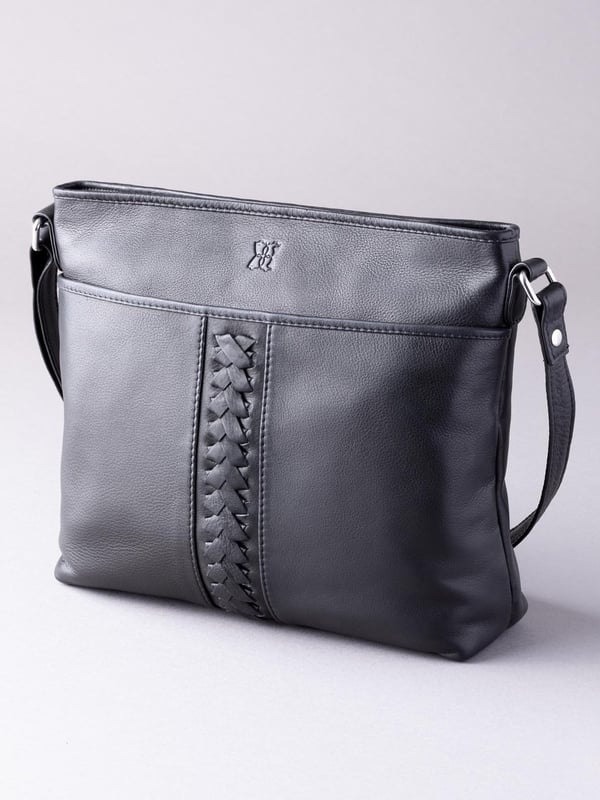 Perfect for carrying your everyday essentials, no matter the season, the Farlam Leather Cross Body Bag in black is a handbag necessity. Easy to co-ordinate with any outfit, it's equally practical and stylish. We've added to the classic silhouette with an intricate plait detail, and of course used the softest leather to create your new favourite handbag.