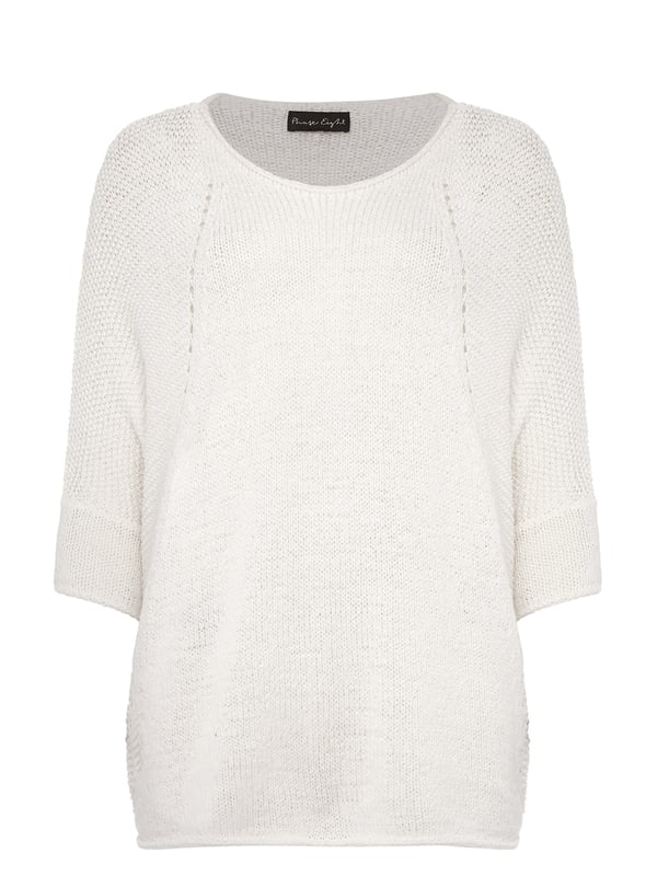This style is responsibly sourced. We're proud to invest in making cotton production more sustainable. A textured tape yarn jumper complete with batwing sleeves and contrast stitch detailing. Finished with a curved extended hem at the back for a flattering fit. This semi-sheer style is best worn with a camisole underneath.