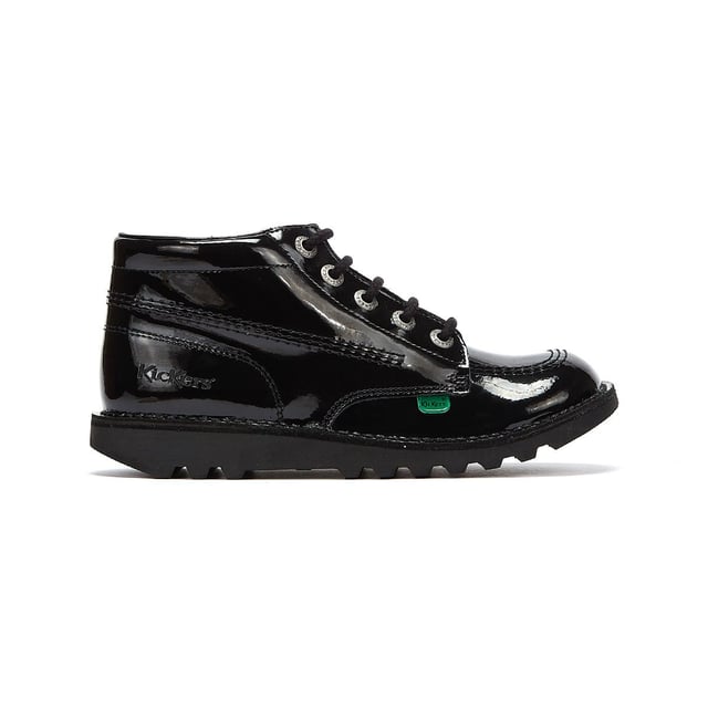 The Kickers Kick Hi Kids Shoe has been on trend since 1975.  With its trademark rubber sole, brass eyelets, and triple stitching for a great classic look.  Now With a Patent leather shiny upper and Trademark Red and Green Tab on side.  Added Kickets Fleurette with a high collar and durable sole for added support.
