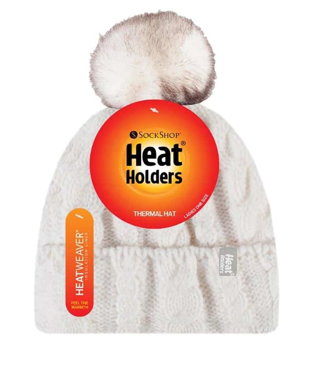 These ladies Heat Holders turn over cuff bobble hats have a fabulous fleece plush insulating lining, called Heatweaver, that is even more effective at holding warm air in that regular lining. This silky, soft lining doesn't just feel luxurious, it also assures you of warm ears in the harsh winter. This all is made with the Heat Holders Yarn which is expertly made in order to keep you nice and warm, with its superior moisture wicking abilities and keep all the cold out. All these features guarantee that you are toasty warm throughout the cold weather. The new pom pom hat has a turn over cuff and a fluffy soft pom pom on the top to give your hat that extra style and character this winter. The outer layer is covered with a beautiful cable knit design. Available in 7 different colours and in one size fits all.