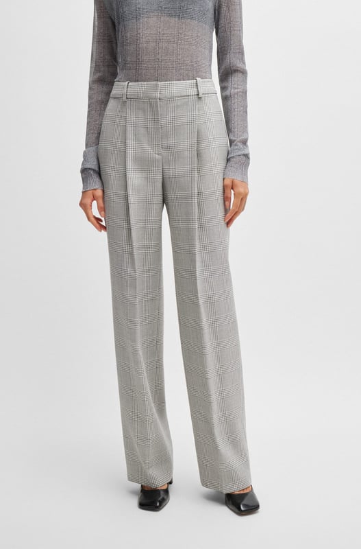 Broek met plooien aan de voorkant van BOSS. Deze rechte broek heeft een Glen-ruitpatroon en is gemaakt van zachte scheerwol. Dit product is gemaakt van wol uit verantwoorde bronnen. Verantwoorde wol betekent voor ons muildiervrij en voldoet aan de normen van de Five Freedoms van dierenwelzijn.- Rechte pasvorm.- Haak- en ritssluiting.- Rechte pijp.- Zakken onder voor: Franse zak.- Zakken onder achter: Gevoelde zak. Materiaal: 100% scheerwol. Ref: 50525277976.