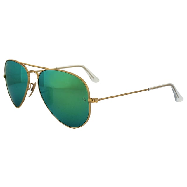 Ray-Ban Sunglasses Aviator 3025 112/19 Gold Green Flash Mirrored 62mm were originally designed in 1936 for US military pilots and have since become one of the most iconic sunglasses models in the world. The timeless design is characterised by the thin metal wire frame, large teardrop shaped lenses and fine metal temples that feature silicone tips and nose pads for a customised and comfortable fit. This classic model is available in various sizes and an array of colourways.