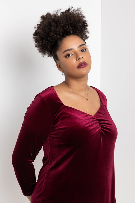 Curve Sweetheart Neck Velvet Dress from Roman. Elegant and always on-trend, opt for this Roman Curve velvet sweetheart neckline dress at your next party function. Fitted to contour the figure and finished with ruching at the bust, this beautiful dress boasts an elegant sweetheart neckline and long sleeves, made to perfection for this party season. Team with a sparkling clutch and your favourite pair of heels for a night to remember.