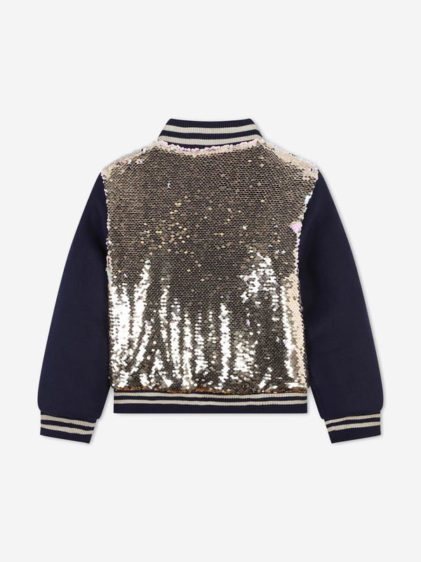 Billieblush apply a mischievous and quirky sensibility to their aesthetic portraits. This girls golden short jacket is a captivating piece to adore. It showcases vibrant sequins all over with long sleeves in wool and striped rib details. Complete with an elegant zip closure on the front, she will be obsessed.‚ 100% Polyester