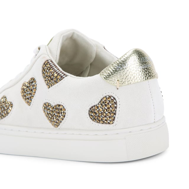 The Kurt Geiger Lane Love sneaker is crafted from a white leather with crystal embellished fabric hearts across the upper. There are two gold leather patches on the tongue and heel with gold foil branding.