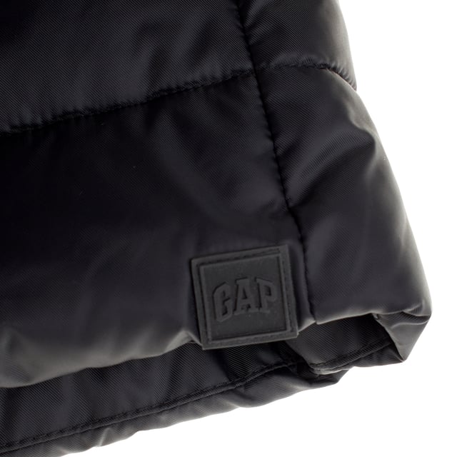 Children's parka jacket made from soft nylon fabric, with a fully padded interior that extends to the hood, providing excellent thermal insulation.

 The water-resistant outer layer ensures additional protection against bad weather.

 This parka features a practical double front closure: a zipper and a flap with buttons, offering additional protection against the wind.

 The elastic drawstring waist with button closure on the inside allows for a comfortable fit.

 Its length hits just below the hip, providing greater coverage in cold weather.

 Additionally, it includes utility flap patch pockets at the hips, offering both functionality and style.

 It is a perfect garment to keep children warm and comfortable in adverse weather conditions.
 Composition: Shell: 100% Nylon; Lining: Acrylic; Interior: 100% Polyester; Faux Fur: 44% Modacrylic, 42% Acrylic, 14% Polyester; Filling: 100% Polyester
 Care:
- Hand wash or delicate cycle.
 - Remove the faux fur trim before washing.
 - Do not use a dryer.
 - Do not iron.
 - Store in a cool, dry place.
