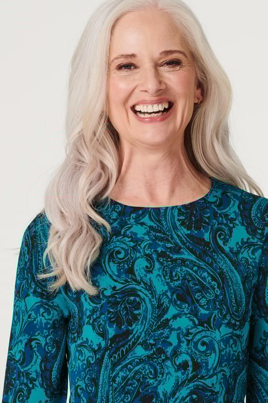 Add an chic asymmetric style to your dress collection with this chic paisley midi. It has a round neck, 3/4 sleeves, a keyhole back, a cinched waist and an elegant midi length skirt with a hanky hem detail. Pair with neutral heels for a daytime style you can wear for anything from lunch with the girls to a day at the races.