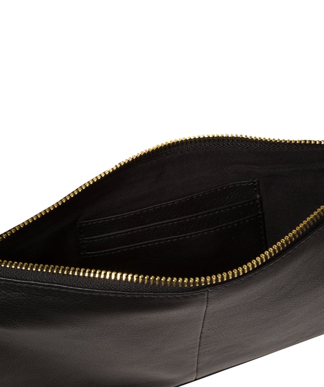 Crafted from high-quality Nappa leather, the 'Anya' cross body bag from Pure Luxuries London's Marylebone Collection is a must-have thanks to the super soft-to-the-touch feel and finish. A stylish zip-over top secures the central compartment which is lined with 100% cotton for a flawless look. Additional storage is provided by three card slots and a slip pocket, perfect for all your essentials. This accessory is adorned with a slim and adjustable strap with a maximum drop length of 65cm and complemented by eye-catching gold-coloured metal fittings and zips which give it an elegant look. The Pure Luxuries logo is embossed for an effortless and sophisticated finishing touch.