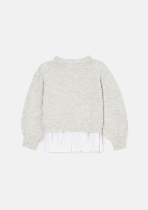 Is this the most perfect Winter knit? You sweater BELIEVE it! Crafted from soft   yarn and encrusted with stunning jewels. it also features a mock shirt panel for ultimate style credits.