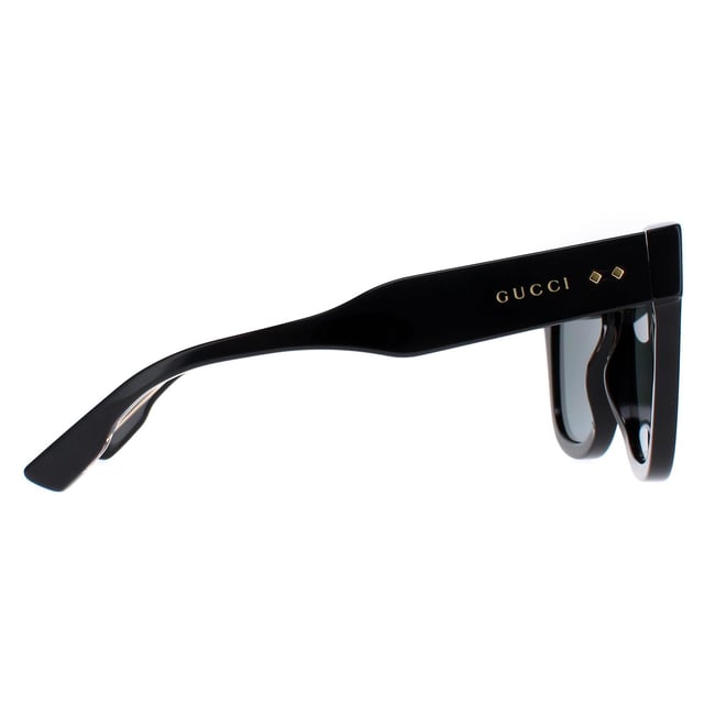 Gucci Aviator Mens Black Grey with Gold Gucci Pattern GG0900S  Sunglasses are a snazzy aviator frame that effortlessly complements any outfit. The frame is made from high-quality acetate, renowned for its durability and lightweight nature, ensuring a comfortable fit. Gucci's logo features on the temples for brand authenticity.