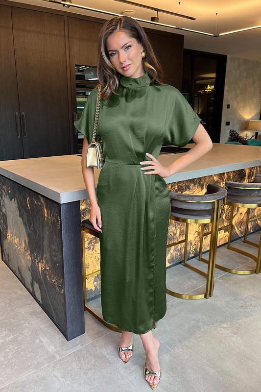 Make a statement in our Olive Satin High Neck Wrap Skirt Midi
Dress. Featuring a high neck with button fastening, short sleeves, an
elasticated waist with pleats detailing, a wrap style skirt and a zip
up back. Style with a pair of black heels and a clutch for a smart
occasion look. 

Model wears: UK 8/ EU 36/ US 4
Model's height: 173cm/ 5'8"
Approx length from centre back to hem: 132 cm
Fabric composition: 100% Polyester

Colour: OLIVE