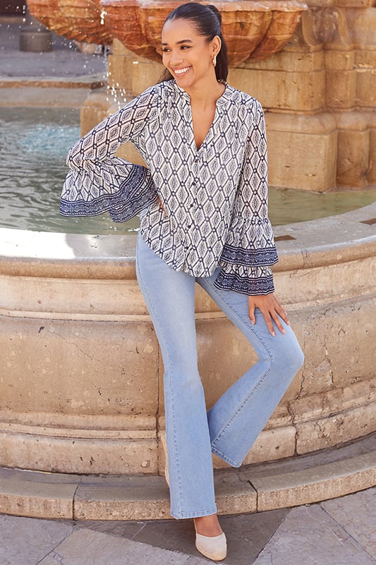 Made to throw on and go
Crafted from gorgeous floaty georgette fabric
Comfy but chic relaxed fit
You'll love the statement fluted sleeves
Add office polish with tailored trousers
We love it with white denim in summer