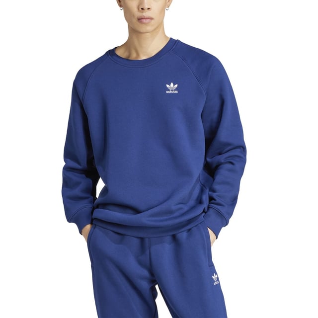 Mens adidas Originals Trefoil Essentials Crewneck Sweatshirt in dark blue - white. Sometimes less is more. The adidas Trefoil Essentials crewneck perfects effortless style and timeless design. An embroidered Trefoil adorns the clean silhouette. Made for everyday casual wear  this crewneck serves laid-back vibes with a simple yet bold look.- Comfortable crewneck sweater made for daily wear.- Regular fit.- Ribbed crew neck.- Long sleeves.- Trefoil logo at left chest.- Ribbed cuffs and hem.- Made with Better Cotton.- Main material: 70% Cotton  30% Polyester (recycled).  Machine washable.- Ref: IM7677