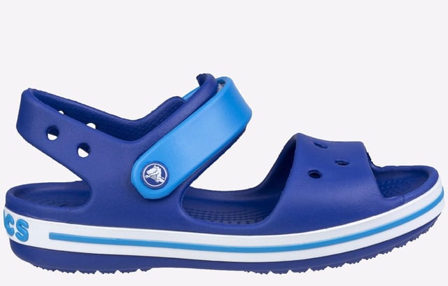 They will dazzle in our kids sandal with cute colours and a comfy fit. Jibbitz charm holes let them add a personal touch.
- Sporty Crocband style for little ones
- Croslite material cushions and comforts
- Heel and ankle strap for a more secure fit
- Comfort Rating: Iconic