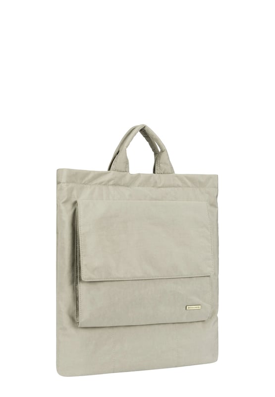 Made from our signature nylon, the Portrait Nylon Tote is the perfect way to carry all your everyday essentials. Featuring a padded carry handle and adjustable crossbody strap with a clip off function. Features: , Zip top opening, Front oversized flap over zip pocket, Rear zip pocket, SMITH & CANOVA antique brass logo, Branded antique brass zips, Padded grab handle, Adjustable crossbody strap (detachable), Internal 15 inch padded laptop sleeve, Internal zip pocket, 2 Internal mobile phone slip pockets - fits normal and plus size smart phones, 2 Internal pen slip pockets Style Ref: 92682 STONE